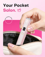 Your Pocket Salon. Woman placing the ultra-portable Gugusure pink wand nail lamp into a purse for easy travel.