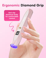 Woman holding the Gugusure pink aluminum nail wand, showcasing its ergonomic diamond grip and anti-slip body.