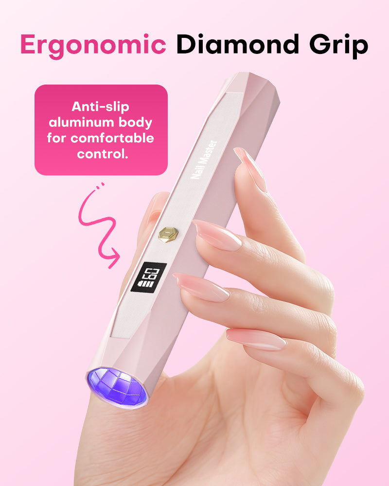 Woman holding the Gugusure pink aluminum nail wand, showcasing its ergonomic diamond grip and anti-slip body.