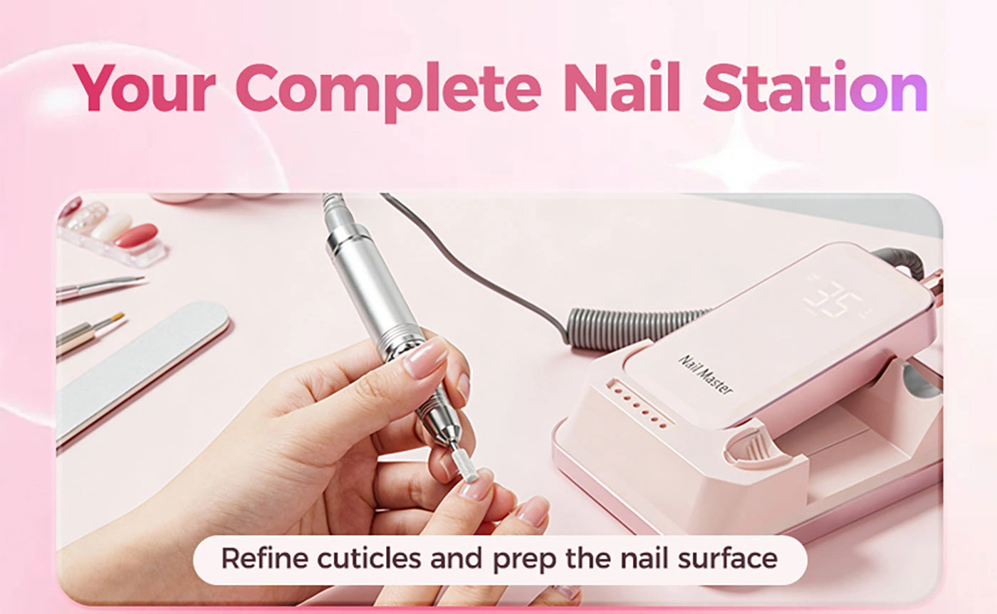 A manicurist using the pink desktop electric nail drill to refine cuticles and prep the nail surface. Part of a complete aluminum nail station bundle featuring a smart base with a blank digital display.