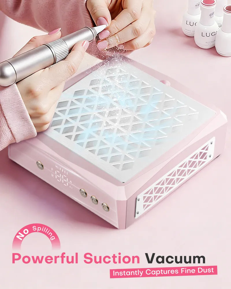 Nail technician filing acrylic nails over a pink aluminum nail dust collector. The powerful suction vacuum instantly captures fine dust, preventing spills and keeping the manicure workspace clean and safe.