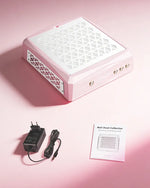 Unboxing the pink professional aluminum nail dust collector. The complete kit includes the heavy-duty metal vacuum unit with a blank screen, a power adapter, and a detailed user manual.