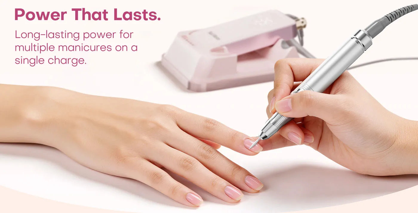 Nail technician using the Gugusure rechargeable nail drill. Features a 2600mAh battery for long-lasting power across multiple manicures.