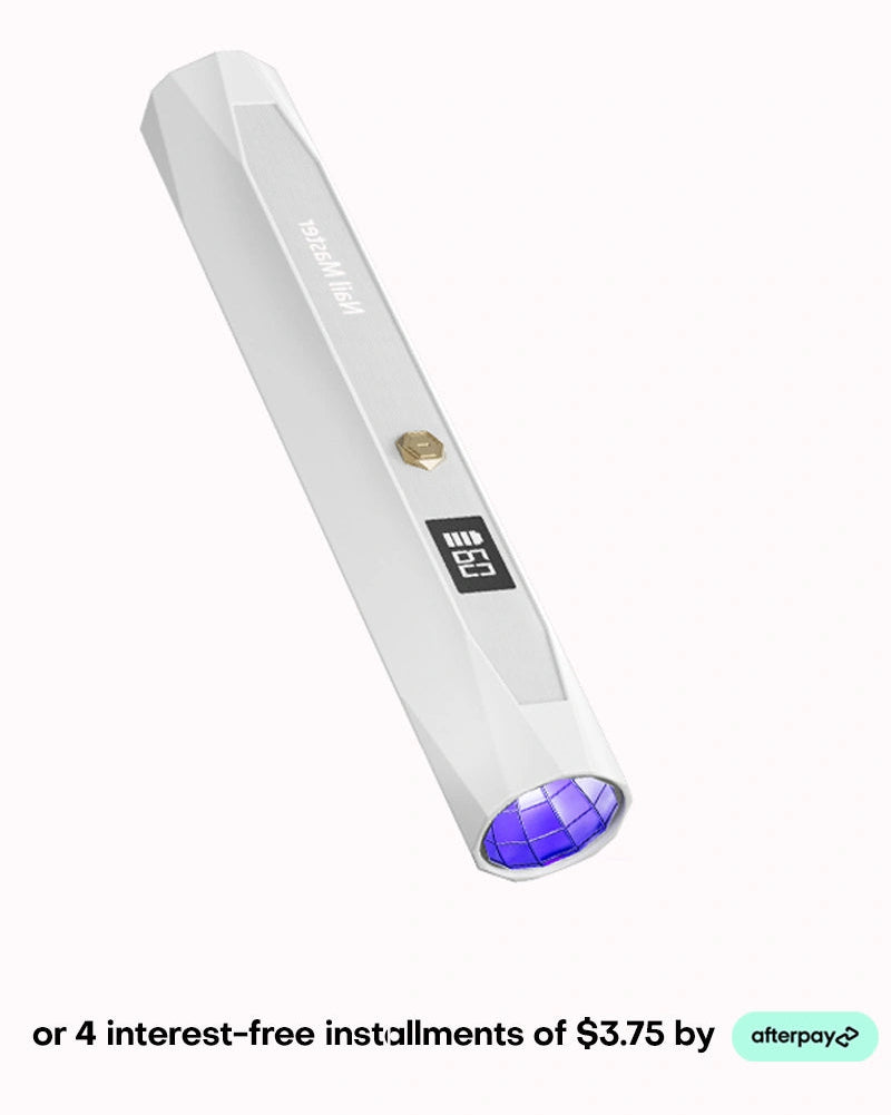 Upgrade your manicure toolkit with this white handheld mini UV LED nail lamp designed for quick and precise single-finger curing. This portable pen-style flash cure light features a modern faceted exterior, a simple gold control button, and a clean blank digital screen, making it the perfect tool for flawless gel extensions on the go. Grab this compact beauty essential today and easily manage your budget with four interest-free installments of $3.75 through Afterpay.